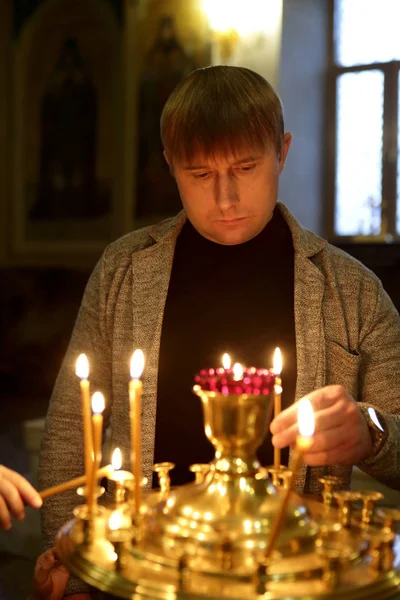 Man with a candle — Stock Photo, Image