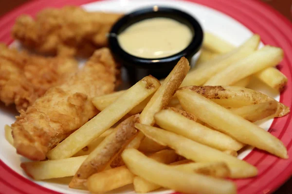 Chicken nuggets with french fries — Stock Photo, Image