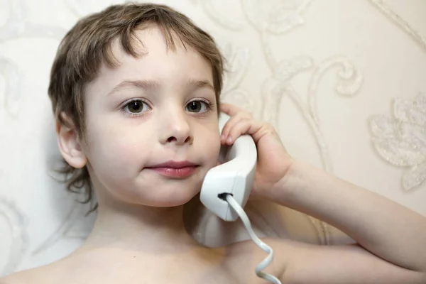 Child holding phone — Stock Photo, Image