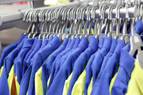 Knitted suits on hangers — Stock Photo, Image