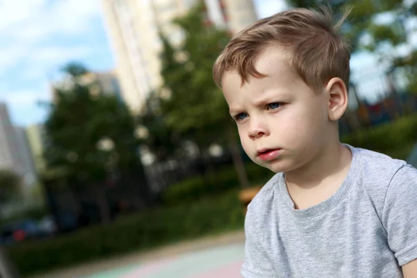 Serious child outdoor — Stock Photo, Image