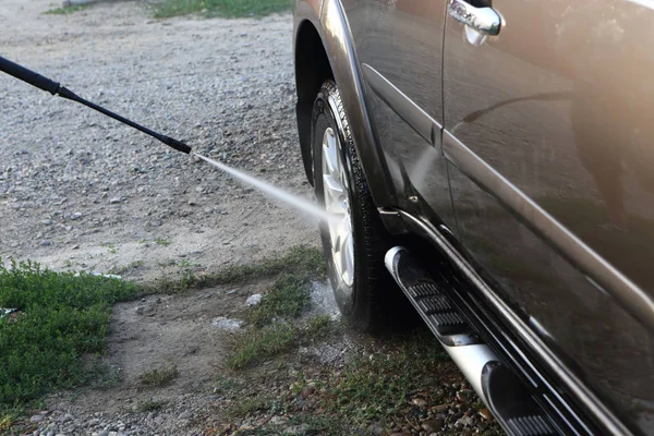 Person washing car — Stock Photo, Image