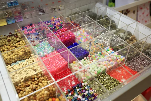 Various beads in boxes — Stock Photo, Image