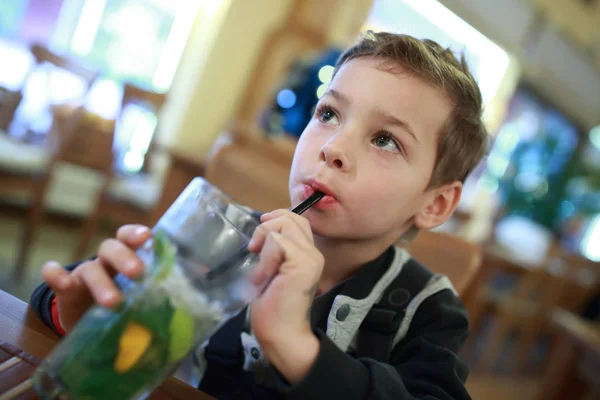 Boy drinking lemonade — Stock Photo, Image
