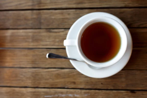 Tazza con nero di tè — Foto Stock
