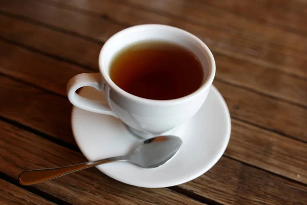 Tazza con nero di tè — Foto Stock