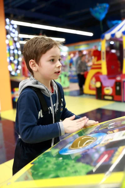 Boy having fun on attractions — Stock Photo, Image