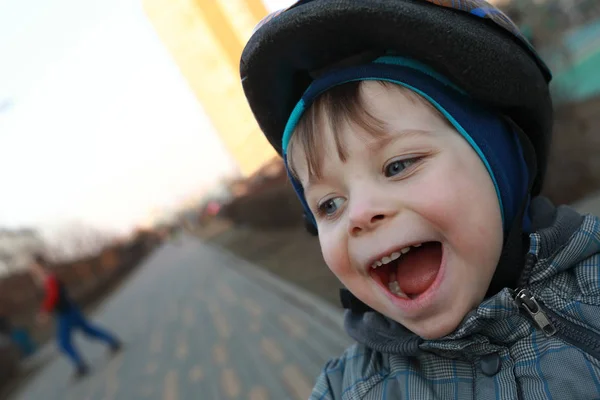 Laughing boy with crash helm — Stok Foto