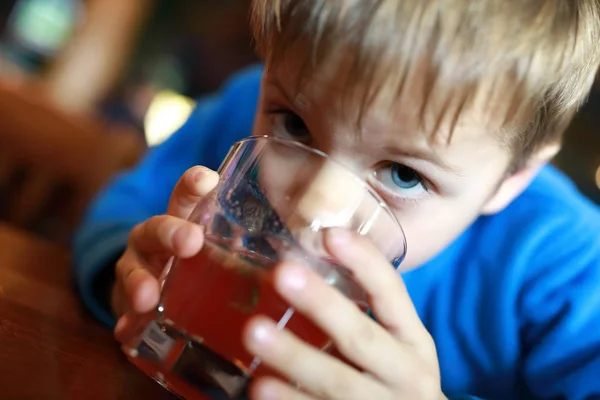 Boy has fruit drink — Stock Photo, Image