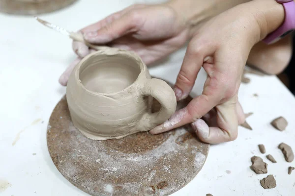 Person making clay mug — Stock Photo, Image