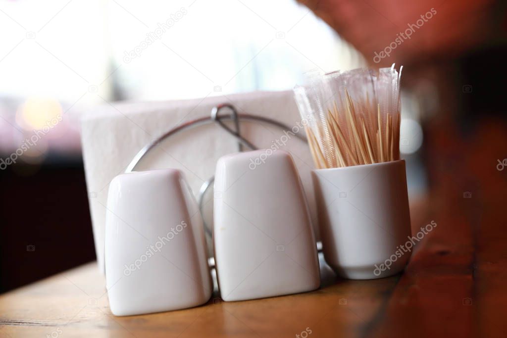 Salt with pepper shakers and toothpicks