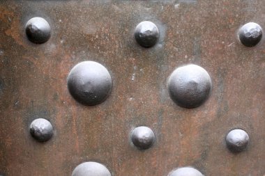 Rivets on iron door