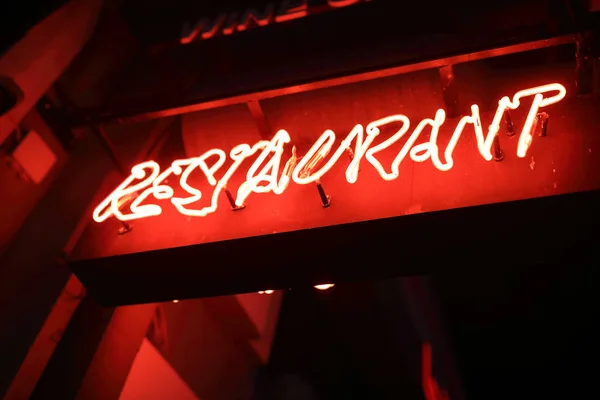 Glowing restaurant sign — Stock Photo, Image