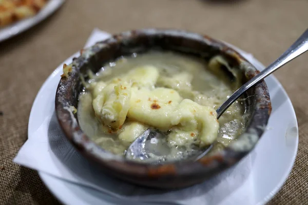 Leftover Cheese on clay plate — Stock Photo, Image