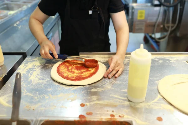 Chef Covers Pizza Dough Tomato Paste Pizzeria — Stock Photo, Image