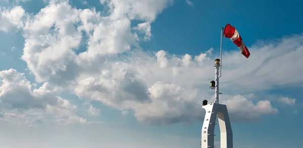 Windsock indikator for vind på himlen baggrund - Stock-foto