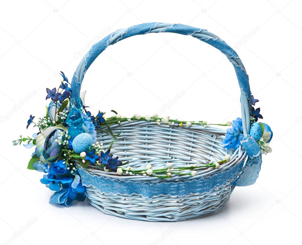Festive basket with a flower arrangement on white background