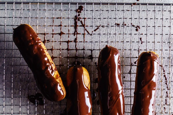 Sweet chocolate eclairs — Stock Photo, Image