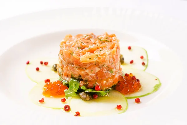 Лосось тартар на тарелке Стоковая Картинка