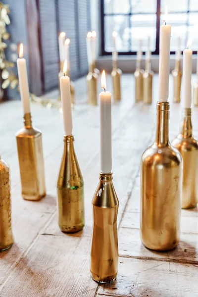 Christmas candles in bottles — Stock Photo, Image