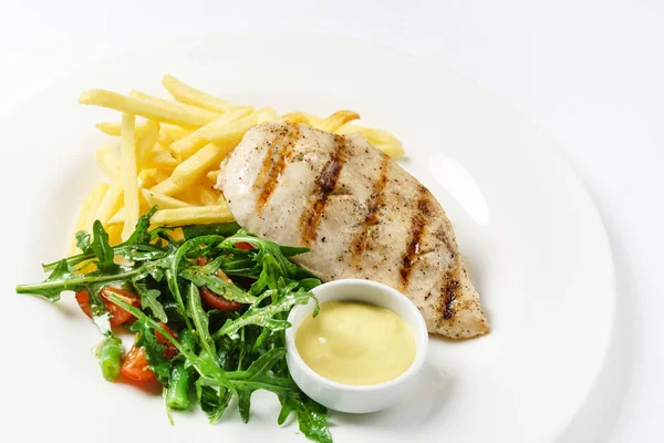 Chicken with french fries — Stock Photo, Image