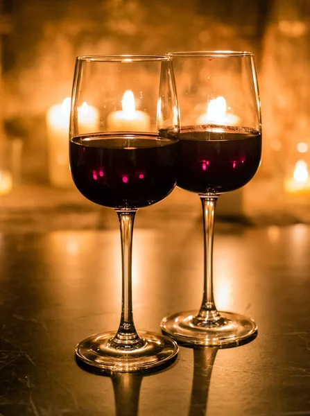 Wine glasses and candles — Stock Photo, Image