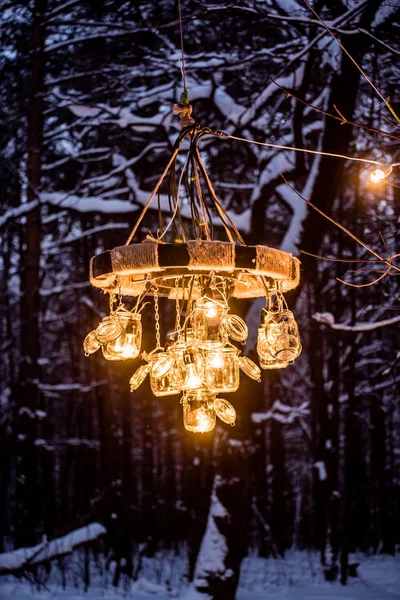 Lantern over winter trees — Stock Photo, Image