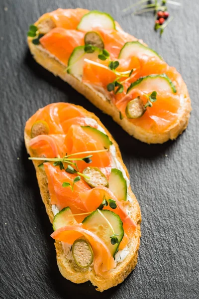 Sandwiches with salmon and cucumber — Stock Image Sandwiches with salmon and cucumber Royalty Free Stock Photos