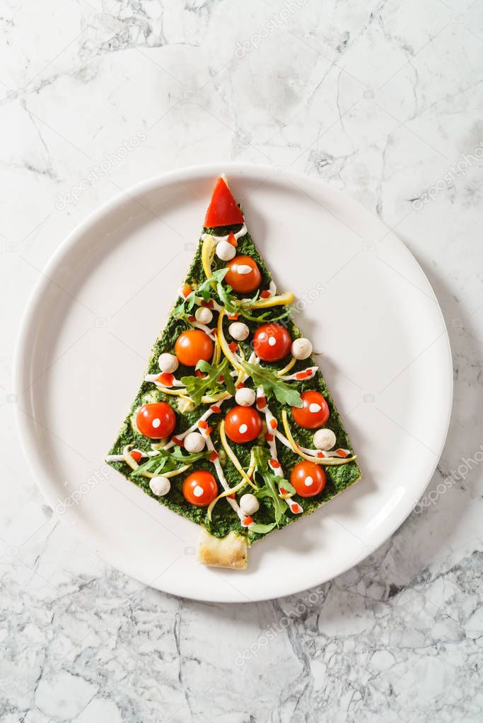 Christmas tree pizza — Stock Photo © Shebeko #134344456