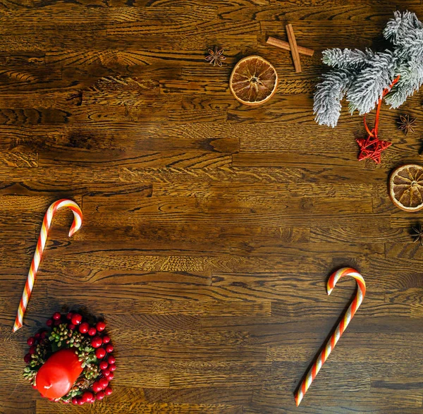 Kerstmis achtergrond met sinaasappelen — Stockfoto