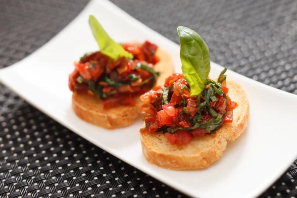 Bruschette con pomodori tritati — Foto Stock