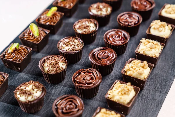Stapel van chocolade snoepjes — Stockfoto