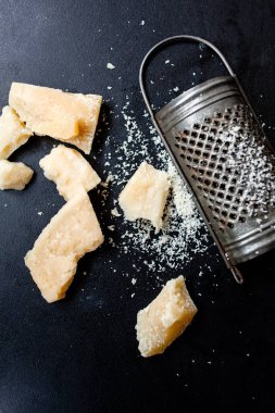 Parmesan cheese with grater clipart