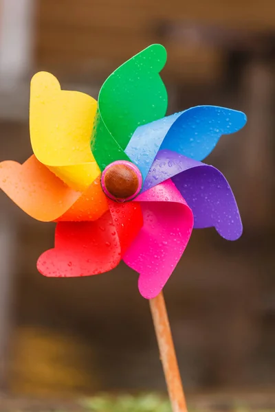 Colorful windmill in drops — Stock Photo, Image