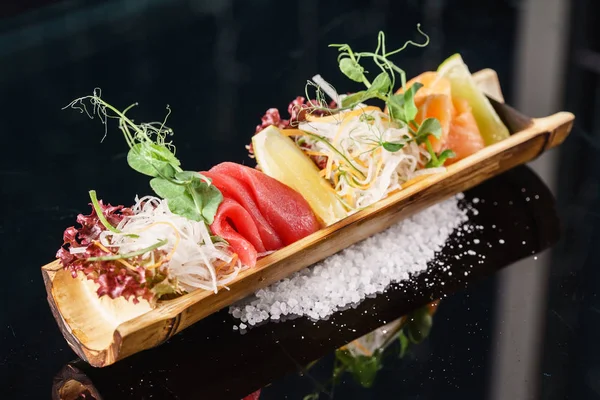 Delicious sashimi in bamboo — Stock Photo, Image