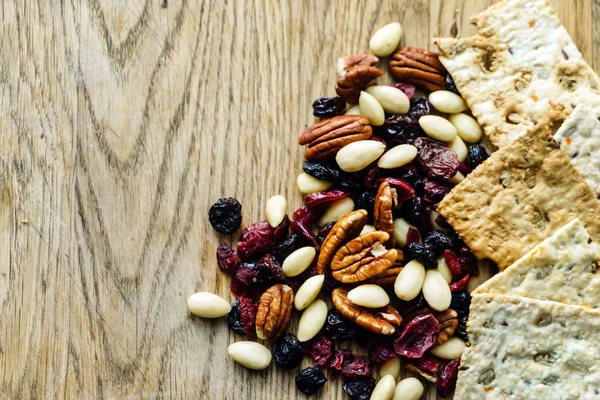 Healthy snacks on wooden table — Stock Photo, Image