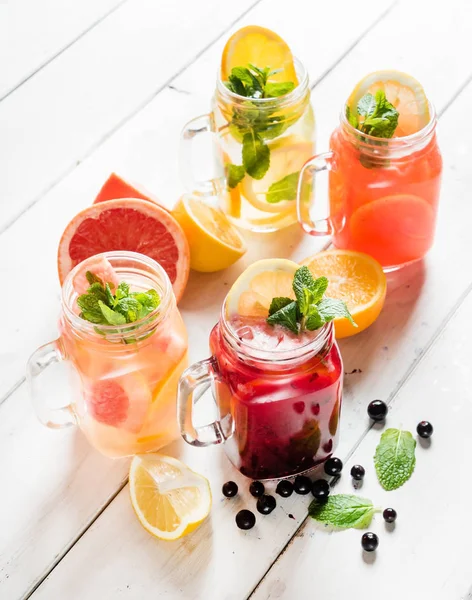 Fruit summer drinks in glasses — Stock Photo, Image