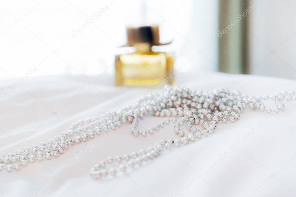 Pearl necklace on table