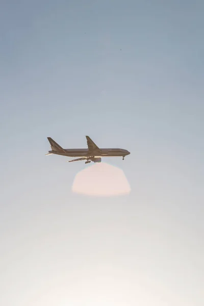 Plane in blue sky — Stock Photo, Image