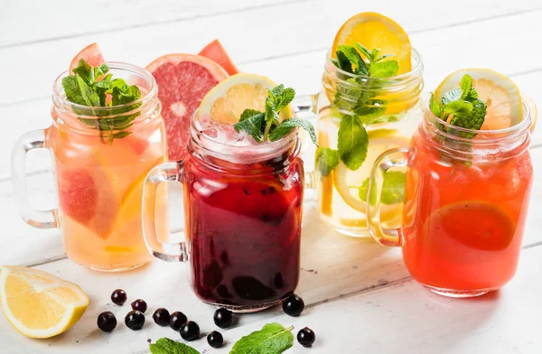 Fruit summer drinks in glasses — Stock Photo, Image