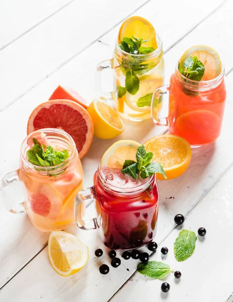 Fruit summer drinks in glasses — Stock Photo, Image