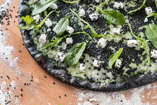 Delicious pizza with black caviar — Stock Photo, Image