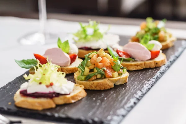 Delicious appetizers on plate — Stock Photo, Image