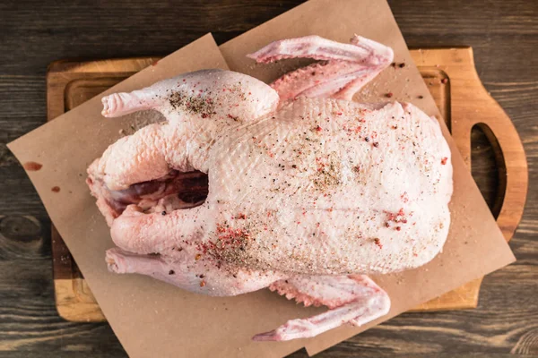 Raw duck with salt and pepper — Stock Photo, Image