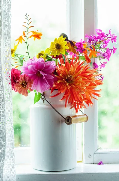 Colorful bouquet on windowsill — Stock Photo, Image