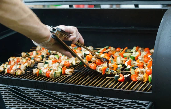 Raw kebabs grilling outdoor — Stock Photo, Image