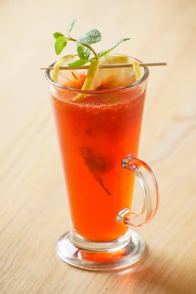 Cocktail in glass on table — Stock Photo, Image