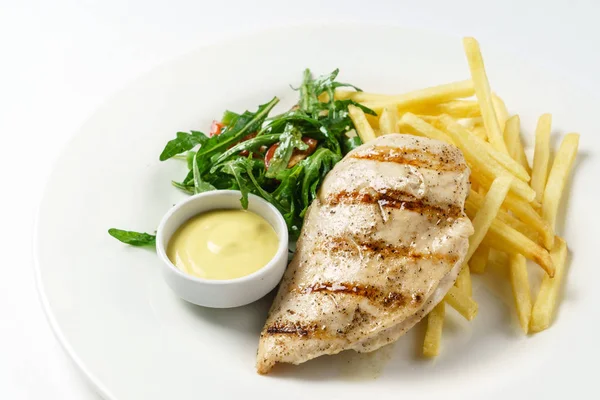 Grilled chicken with french fries — Stock Photo, Image
