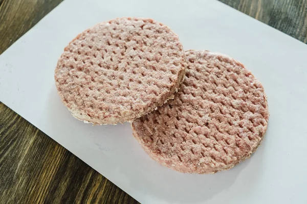 Frozen burger cutlets — Stock Photo, Image