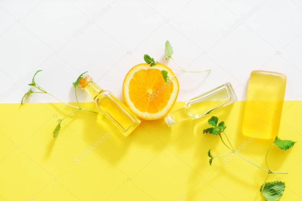 spa concept with oil and oranges
